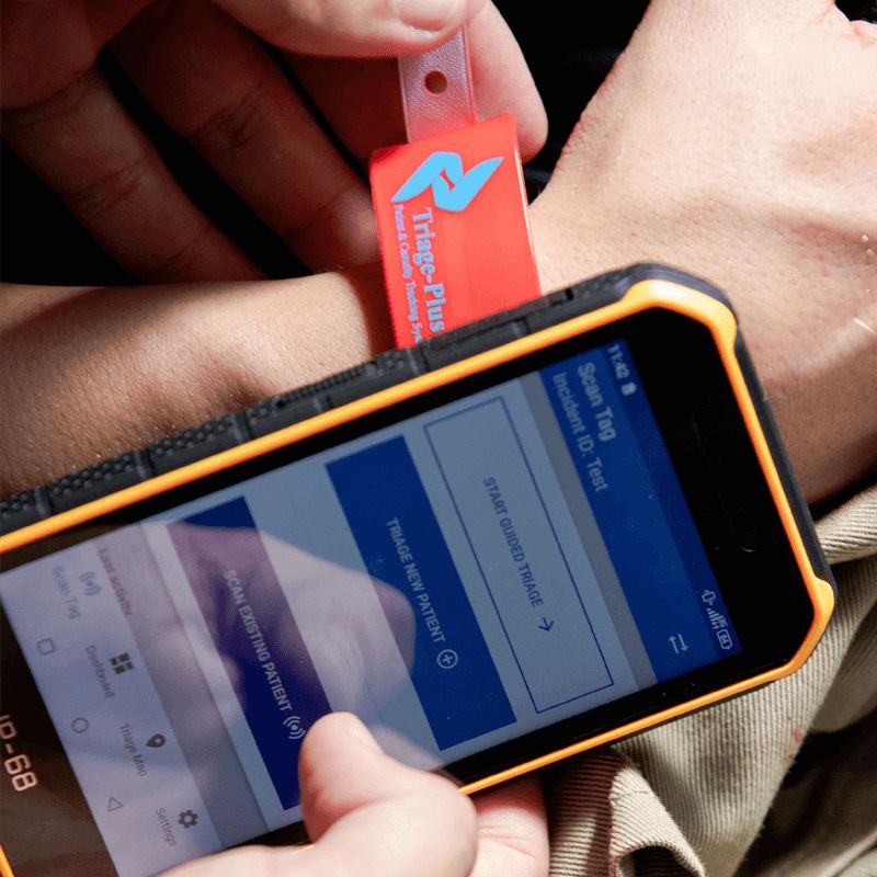Responder scanning a Triage-Plus NFC wristband